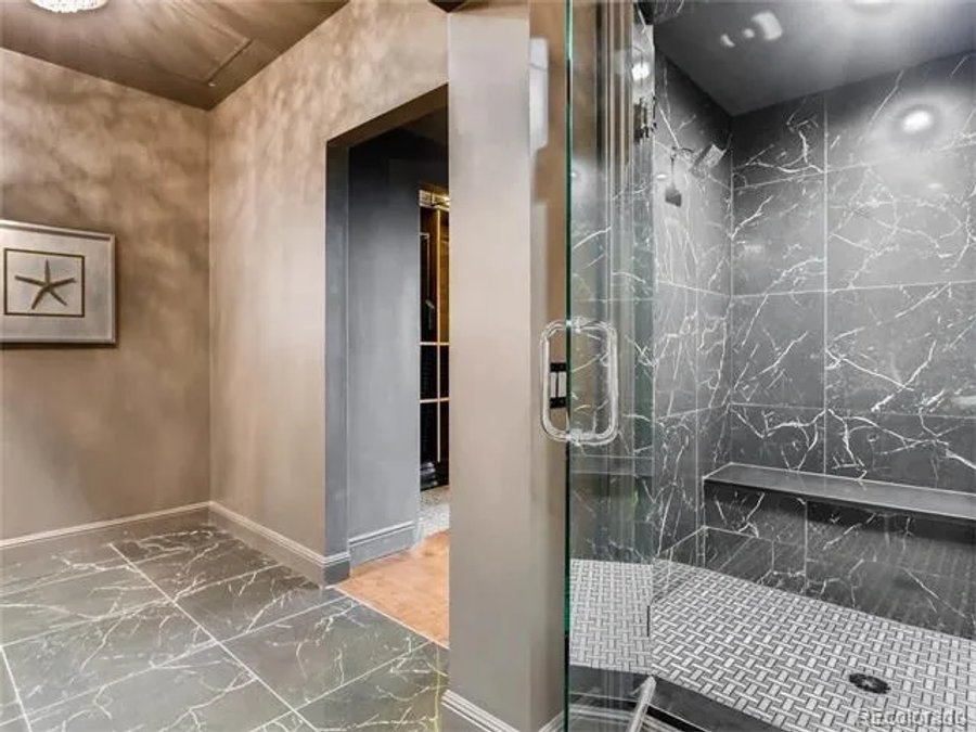 Ritz-Carlton penthouse primary bath with marble shower