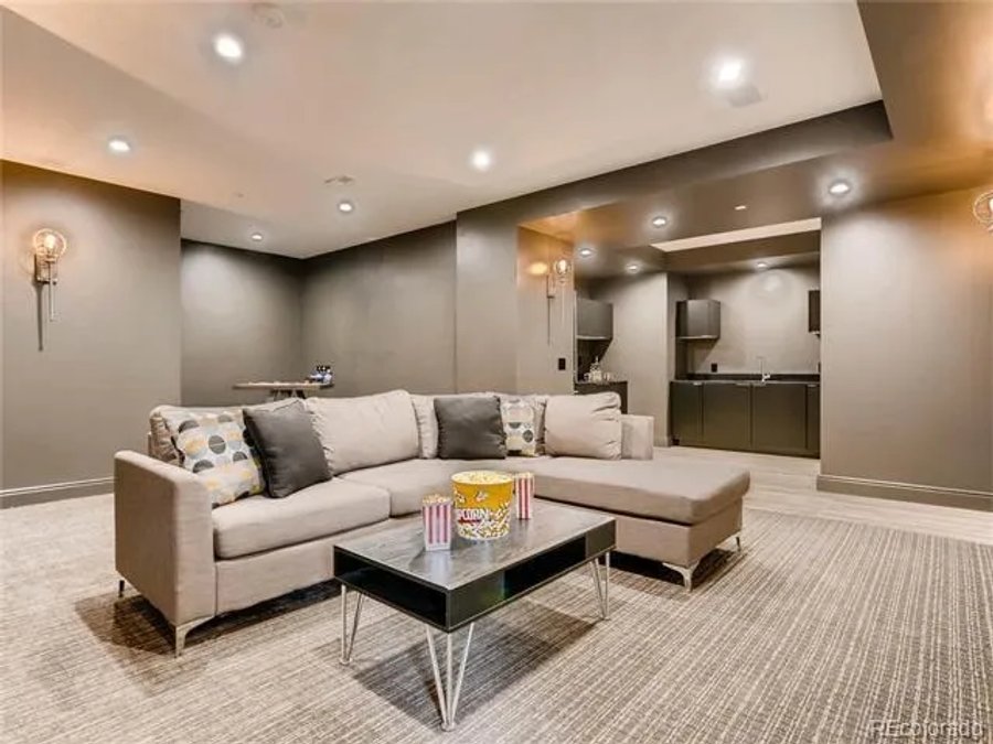 Ritz-Carlton penthouse media room with wet bar