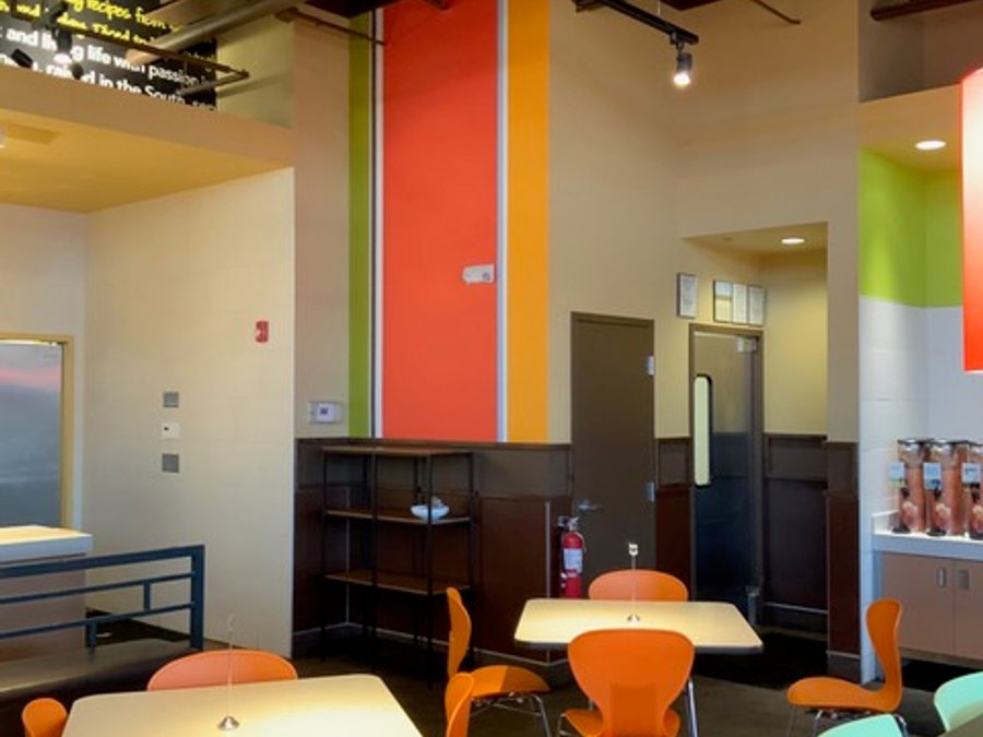 Restaurant remodel with colorful stripe columns and a finished dining area
