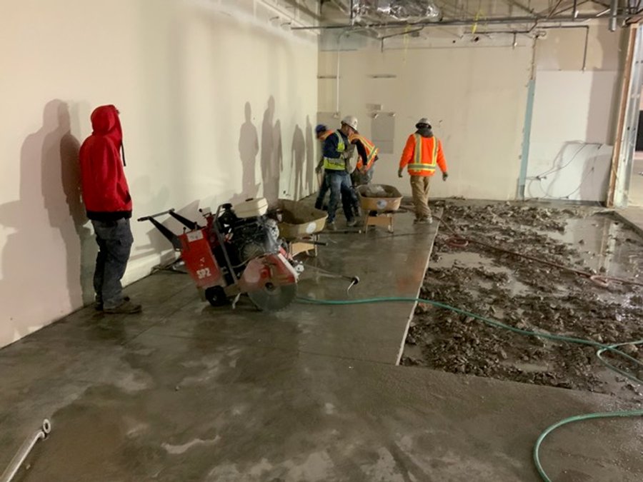 Commercial concrete saw cutting by demo crew in Colorado