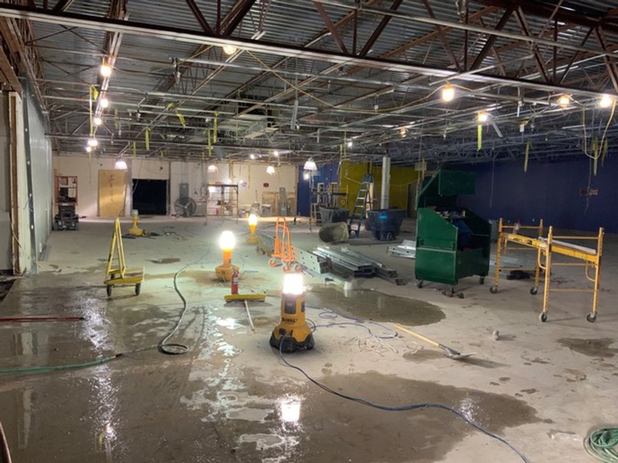 Large commercial space demolition with night work lights